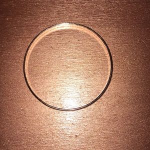 Rose gold bangle.